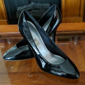 Patten leather pumps